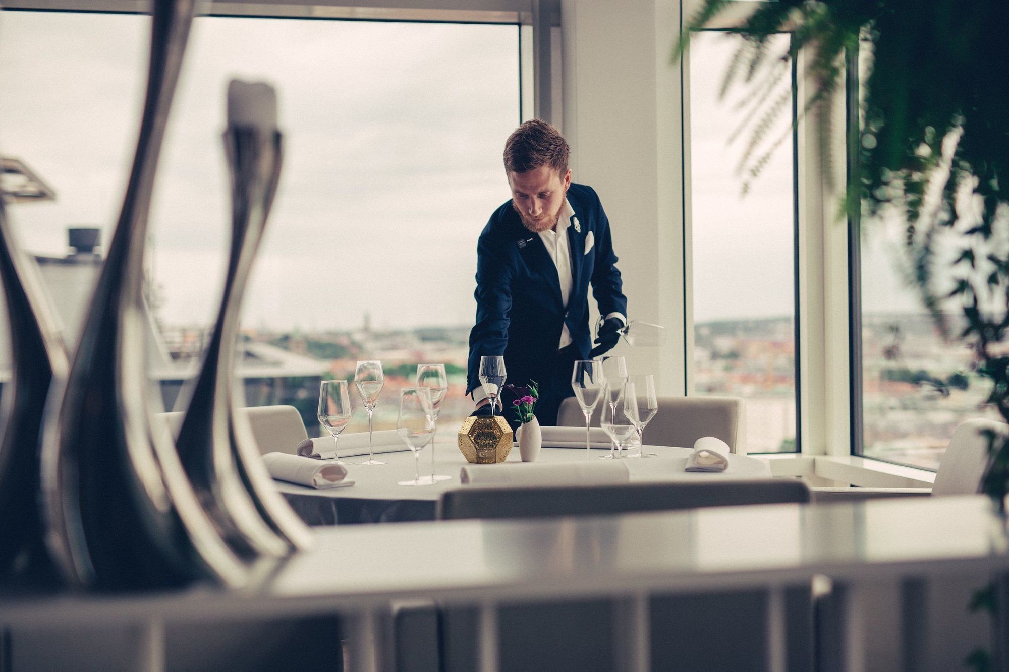 Upper House Hotel Gothenburg Restaurant photo A butler at work